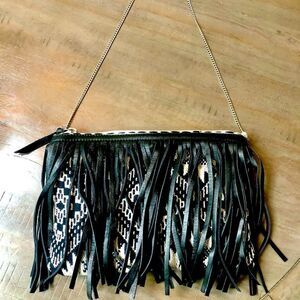Chico’s shoulder bag in black & white w black leather fringe.